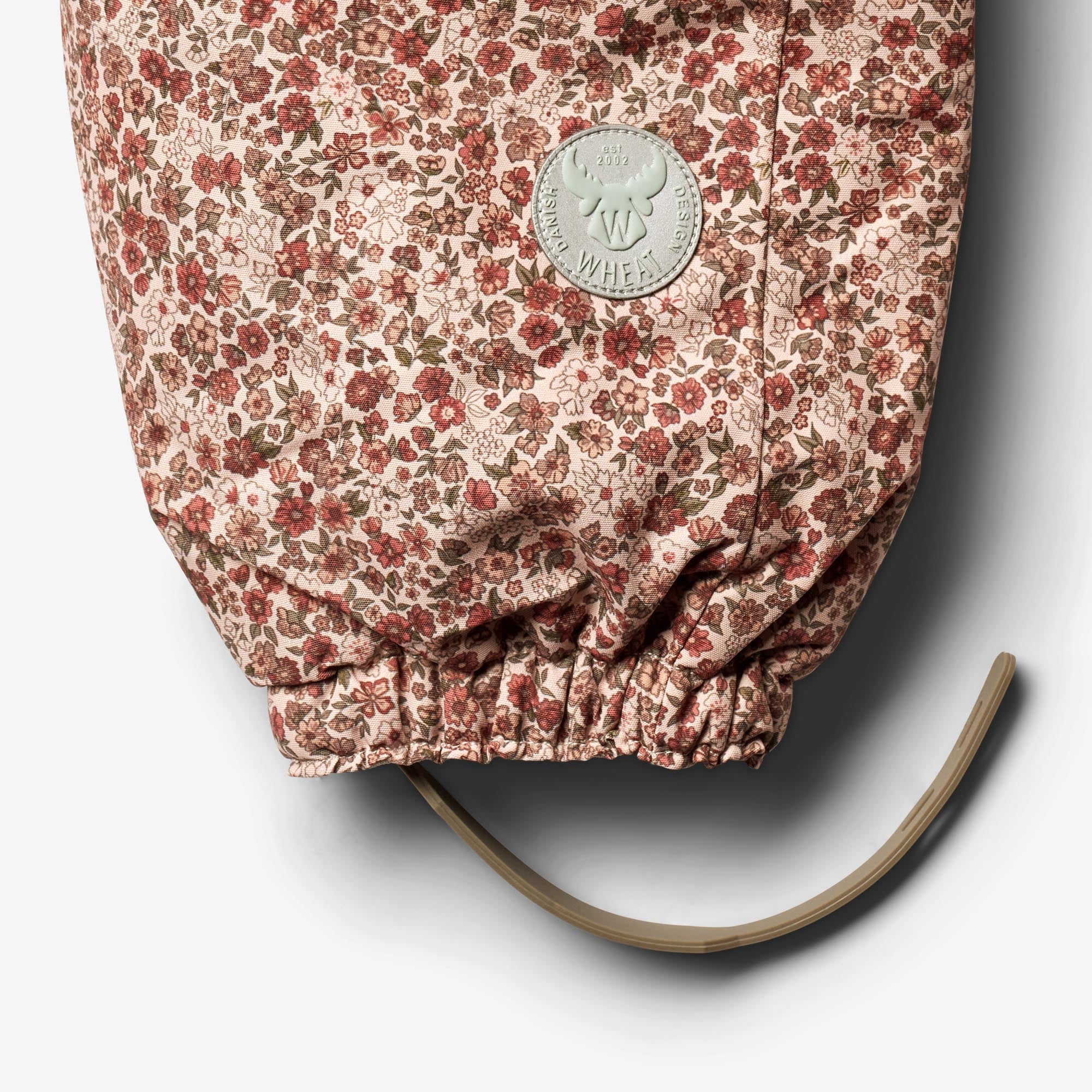 Flyverdragt Nickie | Baby - rose dust flowers