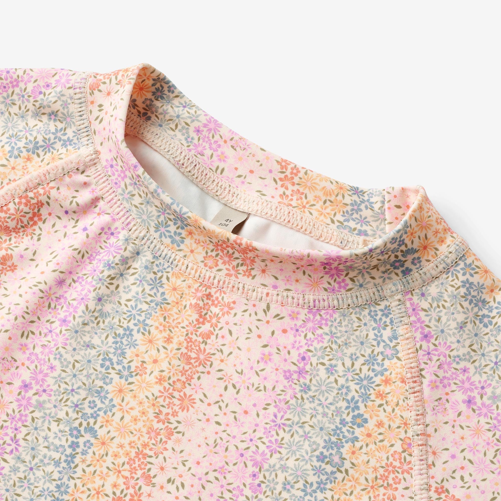 Kortærmet Bade T-shirt Jackie - rainbow flowers